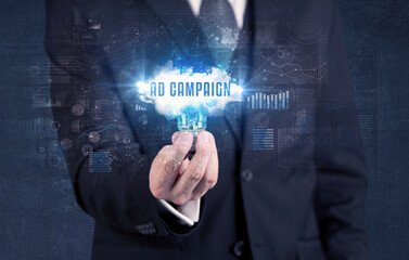 Businessman holding a light bulb, business concept