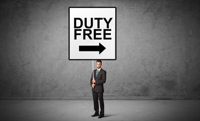 Obraz premium business person holding a traffic sign