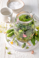 Healthy gherkins with garlic, horseradish and dill. © shaiith