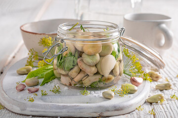 Healthy pickled broad bean with dill, garlic and horseradish.