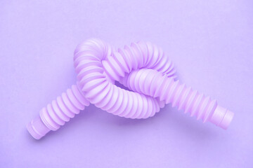 Pop Tube on purple background