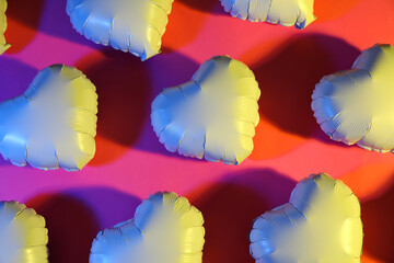 Heart-shaped air balloons for Valentine's day on color background