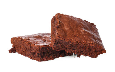 Pieces of tasty chocolate brownie isolated on white background