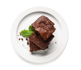 Plate with pieces of tasty chocolate brownie isolated on white background