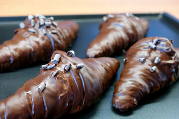 Chocolate-coated croissants