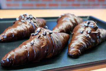 Chocolate-coated croissants