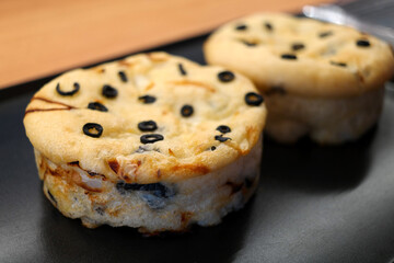 Focaccia is a typical flat bread in Italy, baked with flour and yeast.