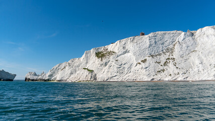 View of chalk cliffs and building near The Needles in Alum Bay, Isle of Wight, United Kingdom