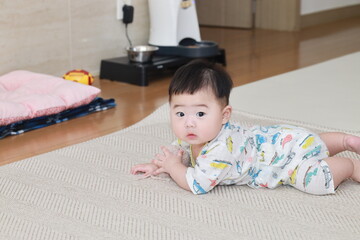 Fototapeta premium child playing in bed