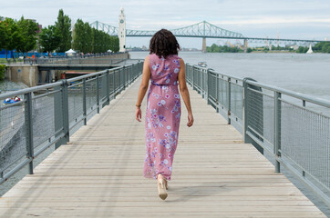 woman walking on the bridge