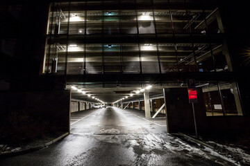 Stockholm, Sweden A parking garage at night in the Vastberga suburb.