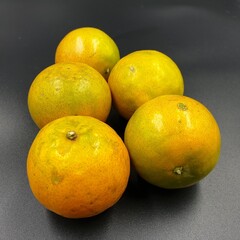 Fototapeta na wymiar Mandarin orange Sai Nam Phueng,Citrus reticulata Blanco 'Sai Nam Phueng'