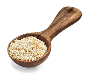 white sesame seeds in wooden spoon isolated