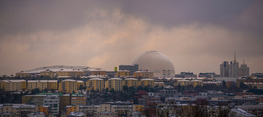 Evening view over the district Hammarby with the Globe Avicii arena a snowy winter day in Stockholm