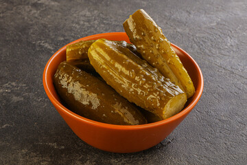 Marinated pickled cucumbers in the bowl