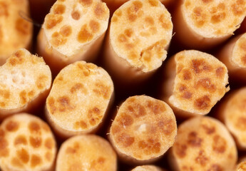 Close up of wooden toothpicks as background.