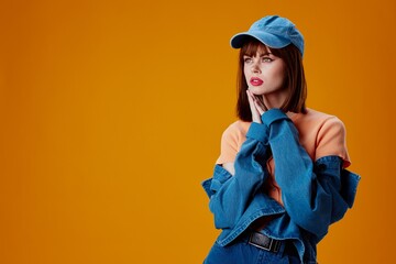 Portrait of a charming lady stylish denim clothing posing color background unaltered