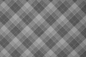 Black and white plaid fabric tartan pattern texture background wallpaper.