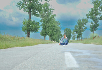 beautiful girl posing in a wheat field.
