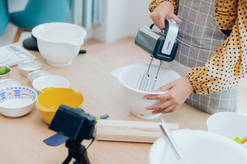 Vlogger or blogger influencer small business broadcasting cooking online concept