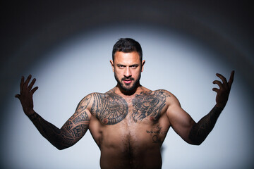 Brutal angry gang man lifestyle, serious handsome guy. Muscular athletic sexy male, naked torso....