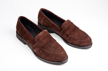 Dark brown suede slippers. Close-up shot.