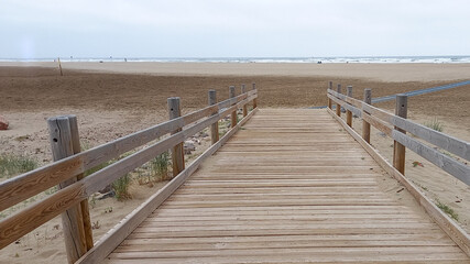 pathway wooden to access beach in Gruissan mediterranean sea France