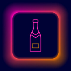Glowing neon line Champagne bottle icon isolated on black background. Colorful outline concept. Vector
