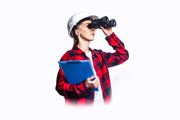 Young woman in construction clothes with clipboard looks through binoculars on a light background.