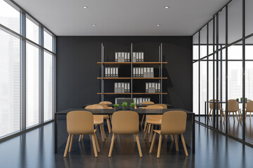 Two tables in dark grey and beige discussion room