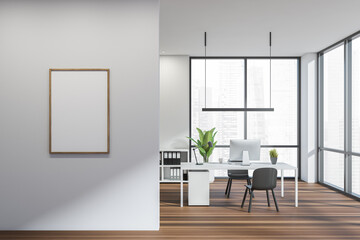 Empty canvas with white wall next to office desk