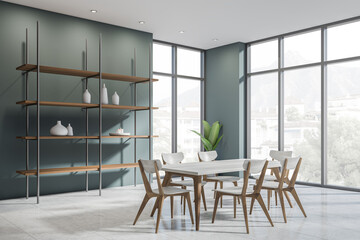 Waiting room interior with chairs and table on tiled floor, panoramic window