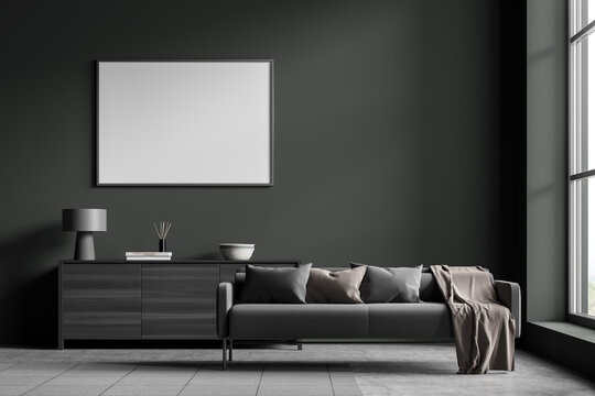 Dark living room interior with couch and commode, mockup poster