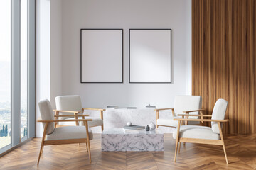 Bright living room interior with two empty white posters, armchairs