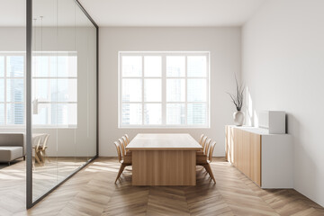 Naklejka na ściany i meble Light meeting interior with seats, table and commode near panoramic window