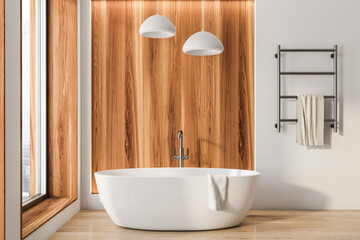 Naklejka na ściany i meble Wooden bathroom interior with bathtub on parquet floor, towel ladder and window