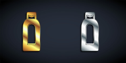 Gold and silver Bottle of shampoo icon isolated on black background. Long shadow style. Vector