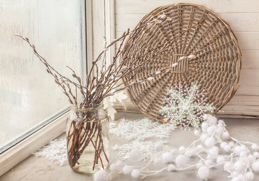 Bouquet of willow and apricot branches  for forced flowering on  window