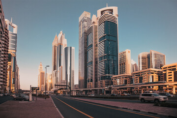 Fototapeta na wymiar DUBAI, UAE - FEBRUARY 2018: Skyscrapers in Dubai Downtown, the fastest growing city in the world