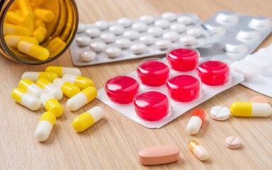 Fototapeta Different medicine pills and capsules in blister packs obraz