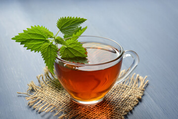 Nettle tea in a transparent cup