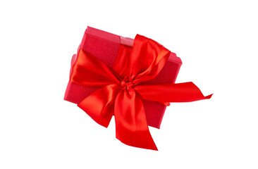 Red present box with big silk bow isolated on white