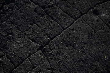 asphalt in cracks texture / abstract background cracks on asphalt road