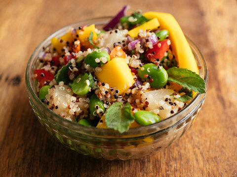 Tropical quinoa salad with mango, pineapple and fava beans.