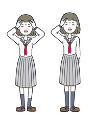 頭を抱えるセーラー服の女子高生
