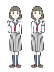 ガッツポーズをしているセーラー服の女子高生