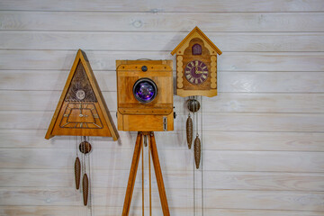 Vintage wooden clock and retro camera