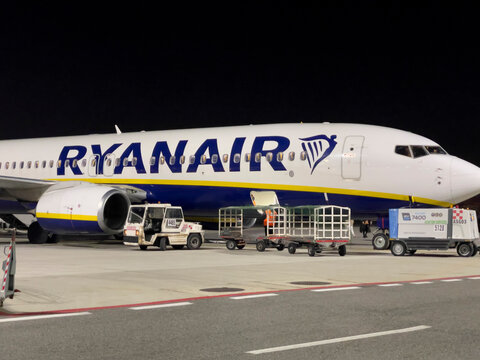 Ryanair airplane at the Ciampino airport in Rome, Italy, at night.