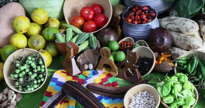  Fruit and vegetables table Ghana dinner party pan. Traditional festival foods at an African party. Fresh taste and plenty to share. 4K HD video footage.
