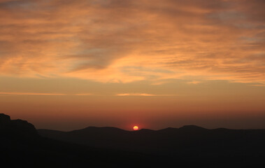 Beautiful sunset and clouds in the mountains